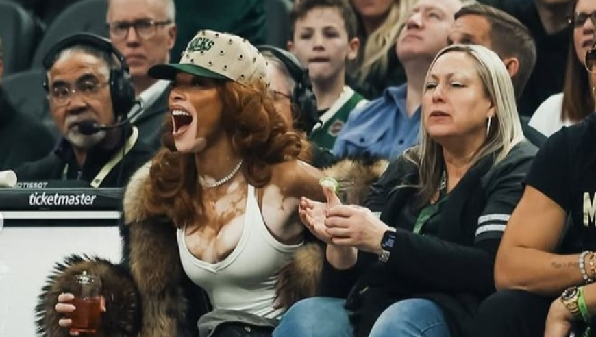 库兹马超模未婚妻晒观战雄鹿美照！场边激情呐喊 秀出性感好身材